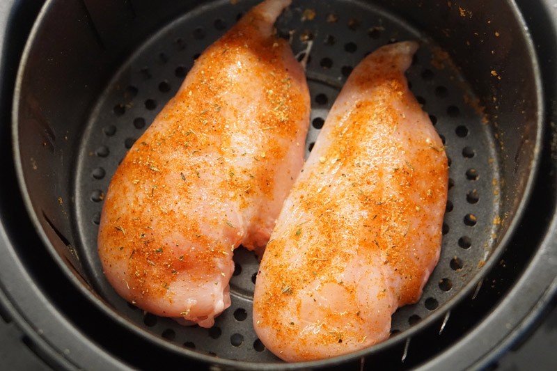 uncooked chicken breast in air fryer