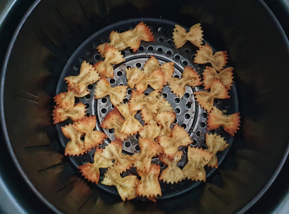 Pasta chips in the air fryer basket