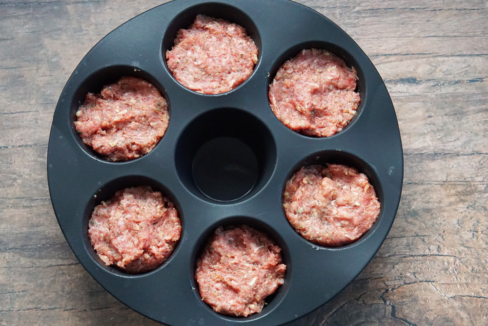 Raw Meatloaf bites in the muffin pan