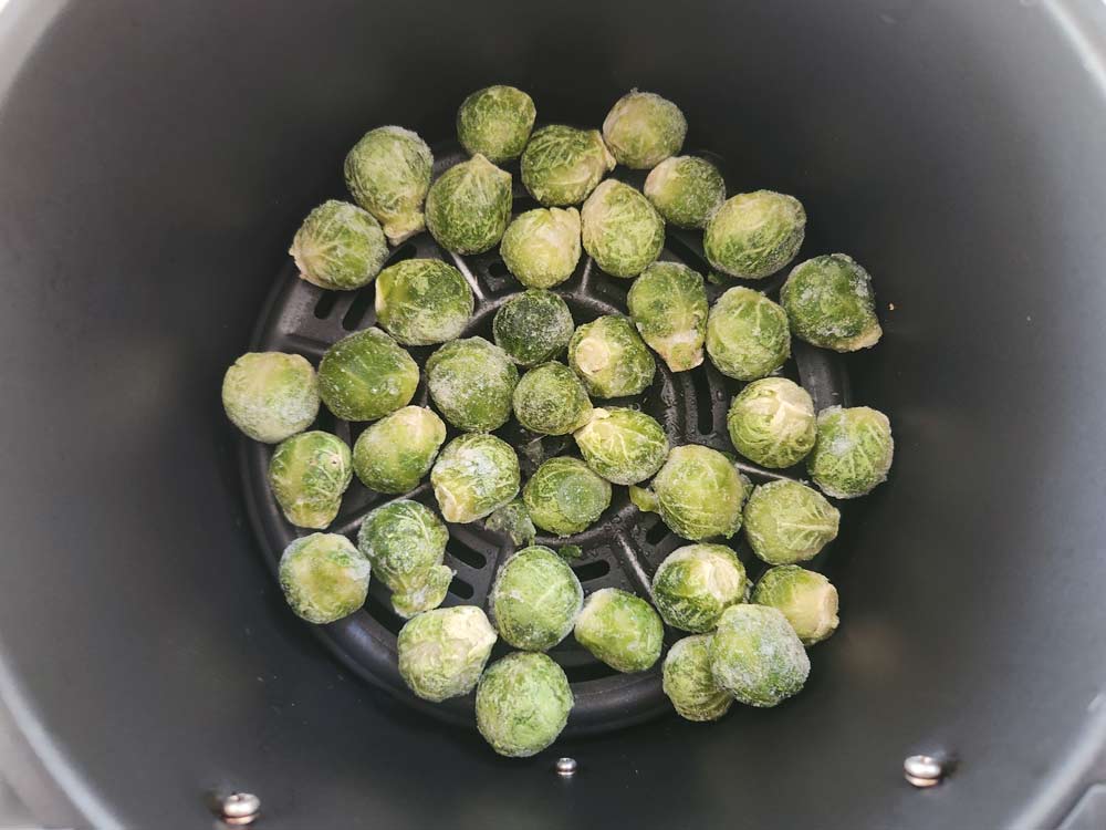 Frozen Brussels sprouts in the air fryer basket