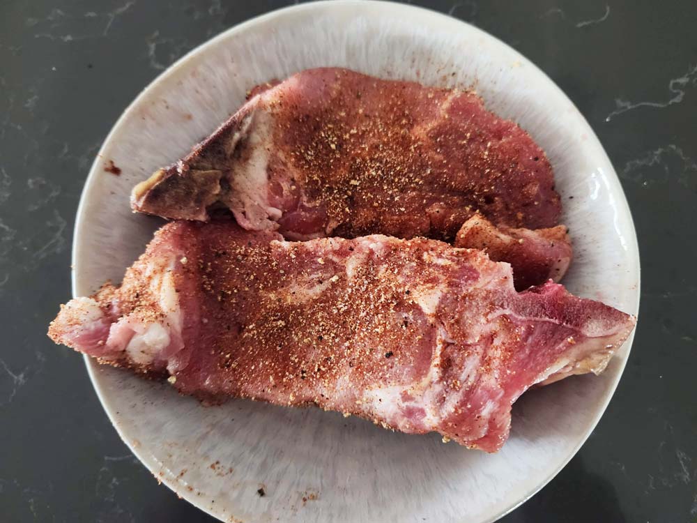 uncooked, seasoned country ribs