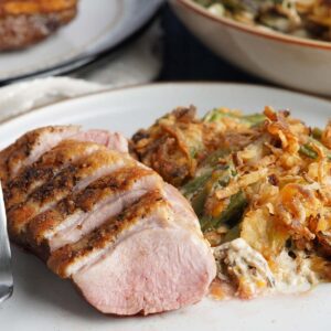 Sliced duck breast with green bean casserole